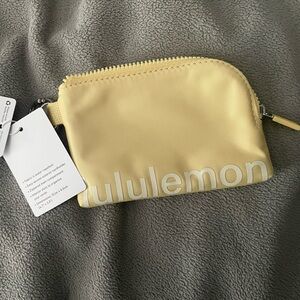 lululemon athletica Pale Yellow Mini Zip Pouch